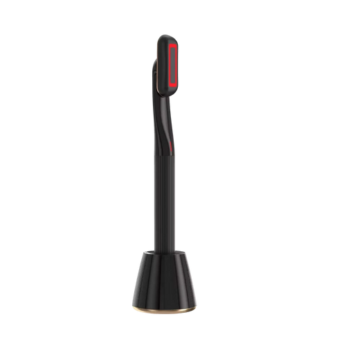 Roselle Wellness 5-in-1 eye therapy wand in black with red LED light, shown on a matching charging base.
