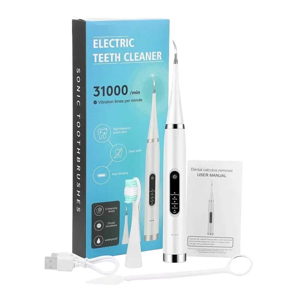 Roselle Wellness electric tooth stain remover kit with sonic cleaner, replacement brush head, and user manual.