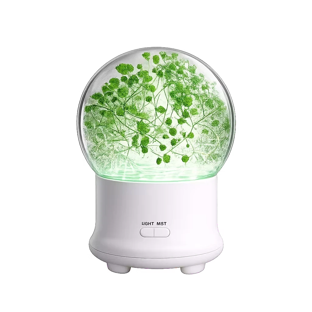 Roselle Wellness flower aromatherapy diffuser with a glass dome containing green foliage and soft internal lighting.